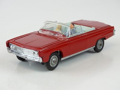 Lot 10 - A CORGI 246 Chrysler Imperial in red with pale...