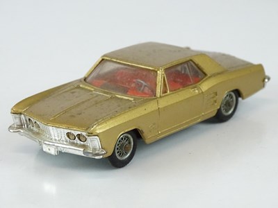 Lot 12 - A CORGI 245 Buick Riviera in metallic gold...