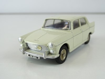 Lot 15 - A FRENCH DINKY 553 Peugeot 404 in cream with...