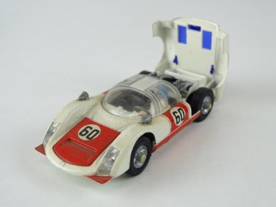 Lot 23 - A CORGI 330 Porsche Carrera 6 numbered 60 - G...