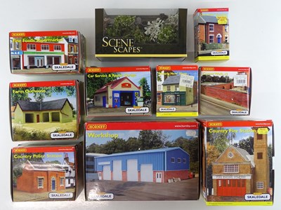 Lot 256 - A group of OO Gauge resin buildings by HORNBY...