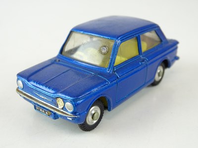 Lot 26 - A CORGI 251 Hillman Imp in metallic dark blue -...