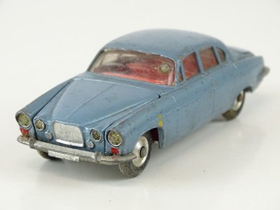 Lot 27 - A CORGI 238 Jaguar Mark X in metallic...