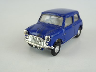 Lot 34 - A TRI-ANG SPOT-ON 211 Austin 7 Mini in dark...