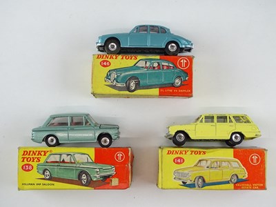 Lot 40 - A group of DINKY cars comprising a 138 Hillman...