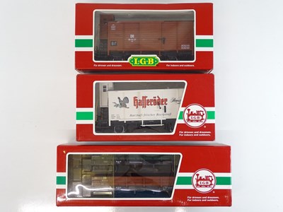 Lot 617 - A group of LGB G scale box vans and bogie flat...