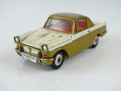 Lot 9 - A CORGI 231 Triumph Herald Coupe in gold/white...