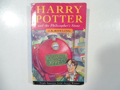 Lot 250 - HARRY POTTER - a run of four paperback books...