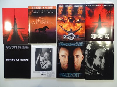 Lot 114 - A group of press packs for various films to...