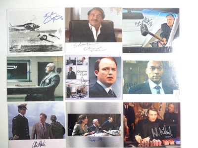 Lot 45 - JAMES BOND - A group of signed 10 x 8 photos -...