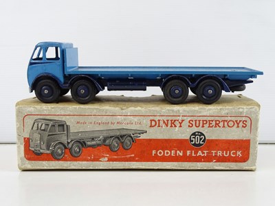 Lot 13 - A DINKY 502 Foden Flat Truck, 1st style cab in...