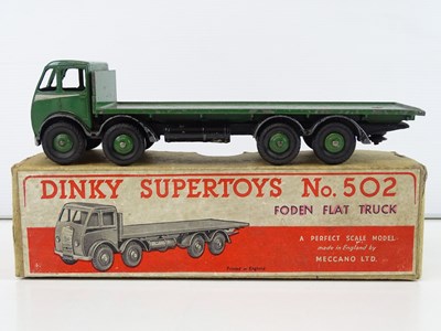 Lot 15 - A DINKY 502 Foden Flat Truck, 1st style cab in...