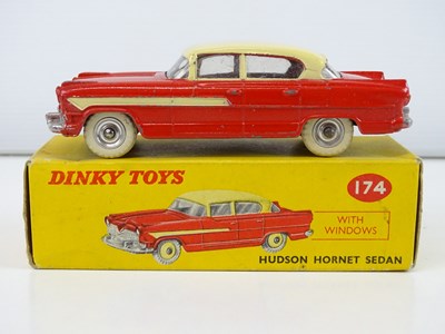 Lot 179 - A DINKY 174 Hudson Hornet Sedan in red/cream -...