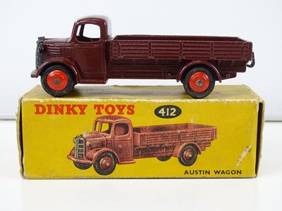Lot 184 - A DINKY 412 Austin Wagon in maroon with red...