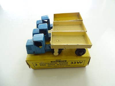 Lot 22 - A DINKY 33W Mechanical Horse/Open Wagon trade...
