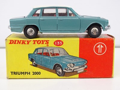Lot 82 - A DINKY 135 Triumph 2000 car in blue/white -...