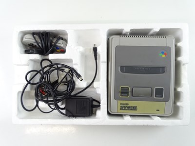 Lot 16 - Super Nintendo Entertainment System (SNES)...