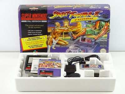 Lot 17 - Super Nintendo Entertainment System (SNES)...