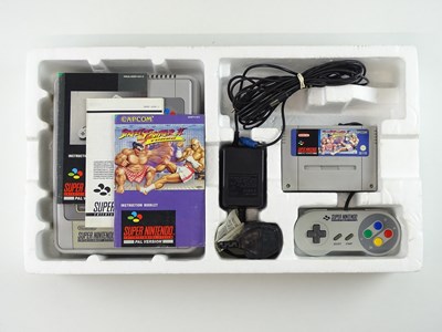 Lot 17 - Super Nintendo Entertainment System (SNES)...