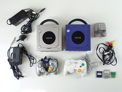 Lot 87 - A pair of Nintendo Game Cubes game consoles -...