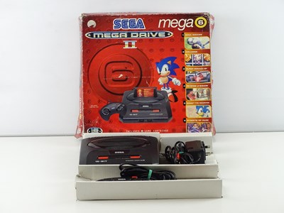 Lot 142 - Sega Mega Drive II console Mega 6 pack -...