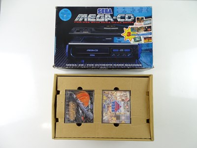 Lot 153 - Sega Mega-CD - an add on unit designed to be...