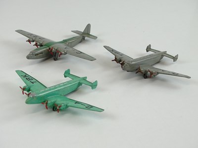 Lot 106 - A group of three unboxed DINKY aircraft...