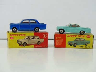 Lot 110 - A pair of DINKY toys cars comprising a 136...