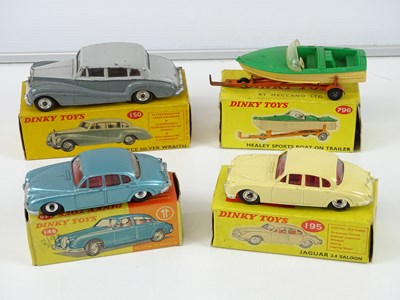 Lot 112 - A group of DINKY cars comprising a 146, 150...