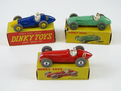 Lot 116 - A group of DINKY racing cars comprising a 23J,...