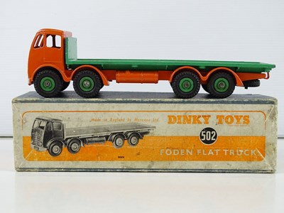 Lot 140 - A DINKY 502 Foden Flat Truck, 2nd style cab in...