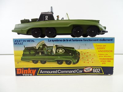 Lot 201 - A DINKY 602 Armoured Command Car in green,...