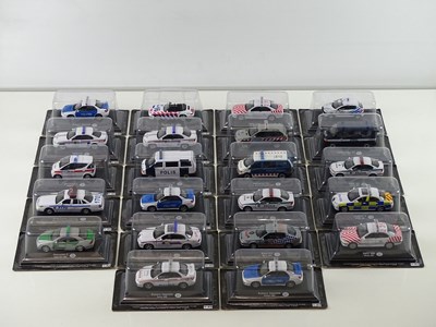Lot 7 - A quantity of 1:43 scale police vehicles by...