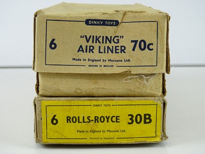 Lot 28 - A pair of empty DINKY Trade boxes comprising...
