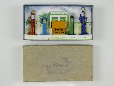 Lot 69 - A DINKY No. 49 pre-war Petrol Pumps set, repro...
