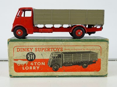 Lot 91 - A DINKY 511 Guy 4-Ton Lorry, 1st style cab, in...