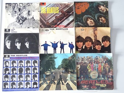 Lot 176 - THE BEATLES - A group of 9 THE BEATLES 12"...