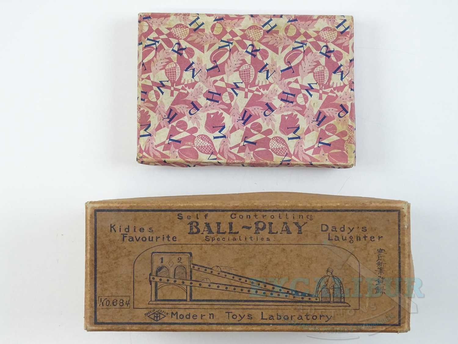 Lot 54 - A pair of early Japanese tinplate toys...