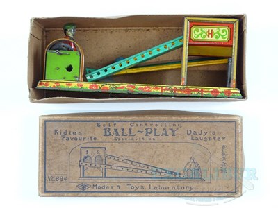 Lot 54 - A pair of early Japanese tinplate toys...
