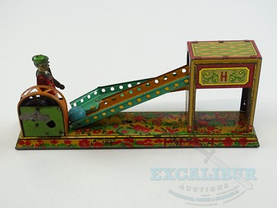 Lot 54 - A pair of early Japanese tinplate toys...