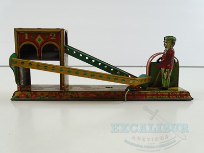 Lot 54 - A pair of early Japanese tinplate toys...