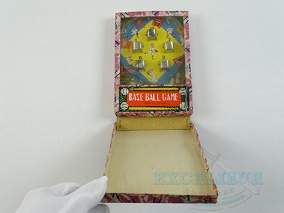 Lot 54 - A pair of early Japanese tinplate toys...