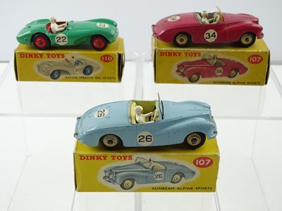 Lot 106 - A group of three DINKY racing cars comprising...