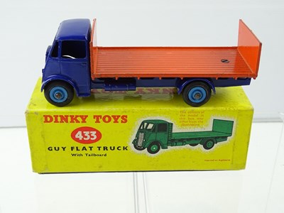 Lot 114 - A DINKY 433 Guy Flat Truck, 2nd Style Cab with...