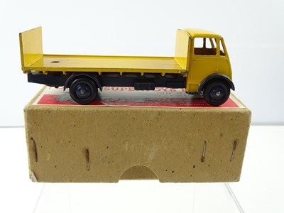 Lot 115 - A DINKY SUPERTOYS 513 Guy Flat Truck, 1st...