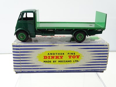 Lot 116 - A DINKY 513/913 Guy Flat Truck, 2nd Style Cab...