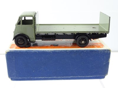 Lot 121 - A DINKY 513 Guy Flat Truck, 1st Style Cab with...