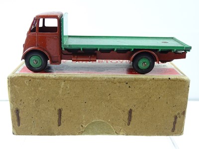 Lot 122 - A DINKY 512 Guy Flat Truck, 1st style cab, in...