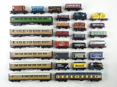 Lot 671 - A quantity of unboxed rolling stock by HORNBY,...