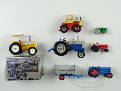 Lot 7 - A group of diecast tractors by ERTL, MATCHBOX...